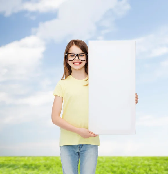 Little girl wearing eyeglasses with blank board — Stock Photo, Image