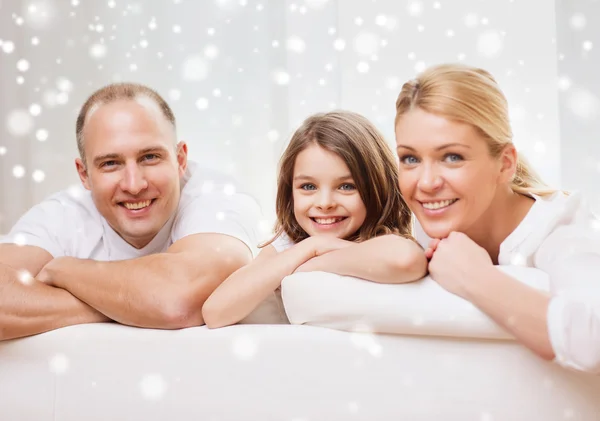 Lachende ouders en thuis meisje — Stockfoto