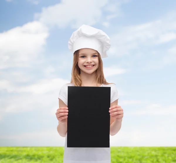 Liten kock eller bagare med blank svart papper — Stockfoto