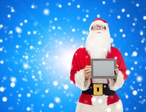 Mannen i kostym jultomten med TabletPC — Stockfoto