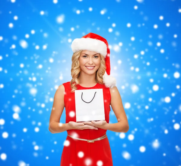 Smiling woman with white blank shopping bag — Stock Photo, Image