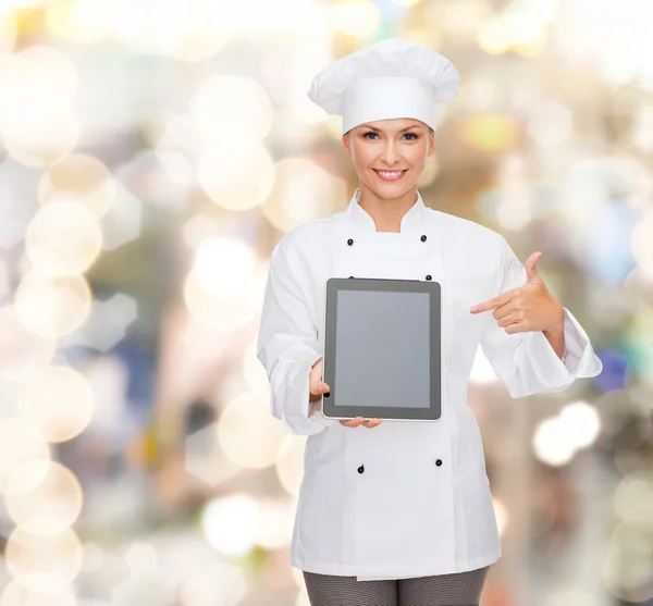 Chef femenino sonriente con pantalla en blanco tablet pc —  Fotos de Stock