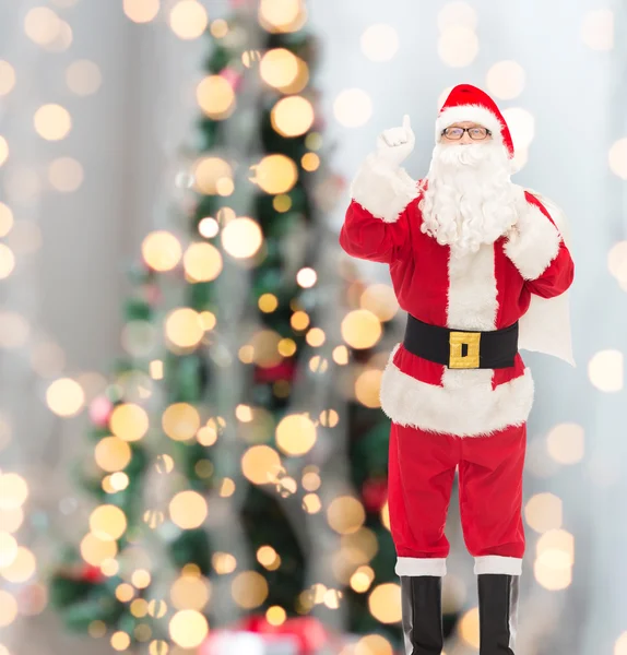 Muž v kostýmu santa Clause s taškou — Stock fotografie