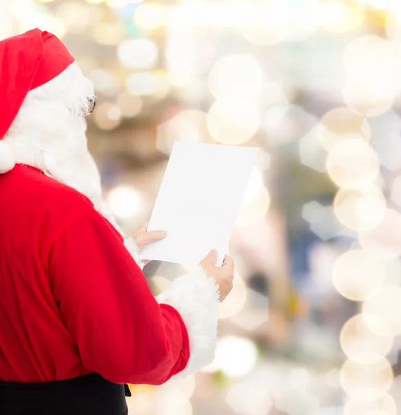 Man in costume of santa claus with letter — Stock Photo, Image