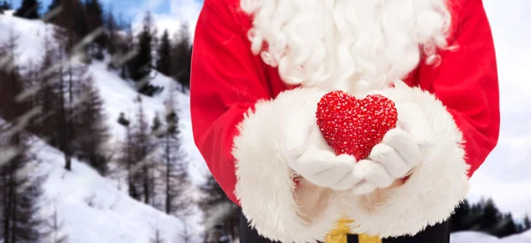 Close up of santa clubs with heart shape — стоковое фото