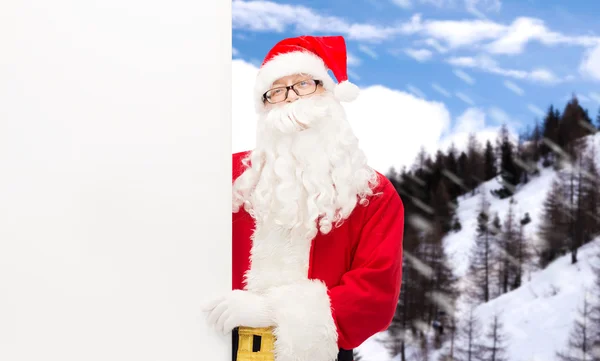 Man in costume of santa claus with billboard — Stock Photo, Image