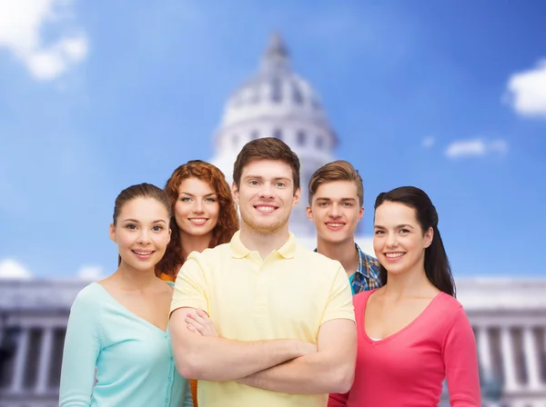 Group of smiling teenagers showing ok sign — Stock Photo, Image