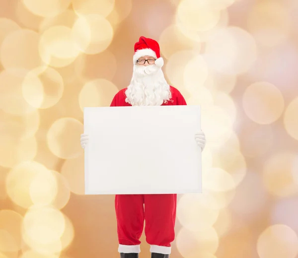 Man in costume of santa claus with billboard — Stock Photo, Image