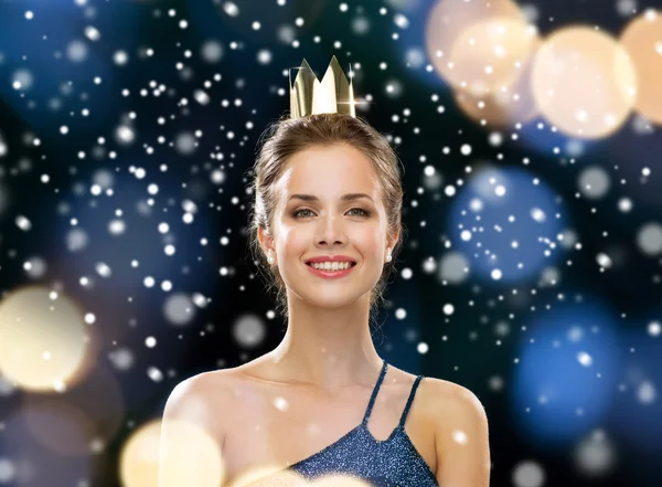 Smiling woman in evening dress wearing crown — Stock Photo, Image