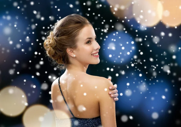 Smiling woman in evening dress — Stock Photo, Image