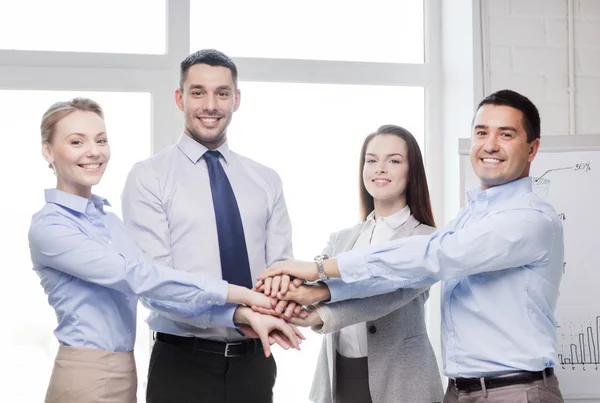 Business team celebrating victory in office — Stock Photo, Image