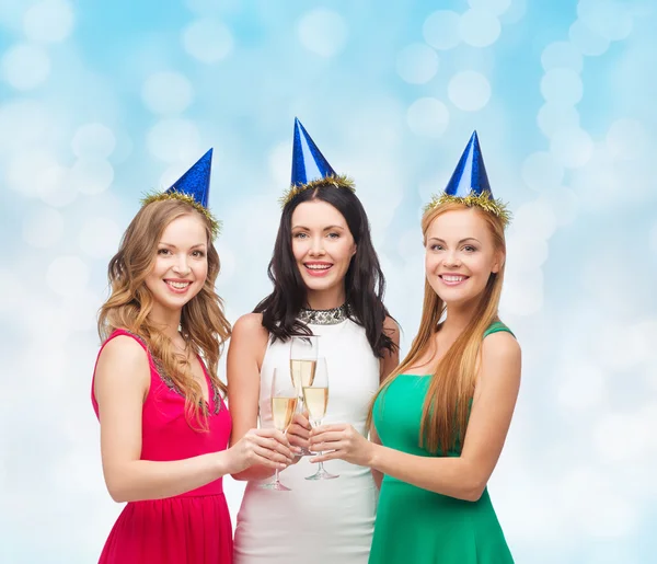 Smiling women holding glasses of sparkling wine Stock Picture