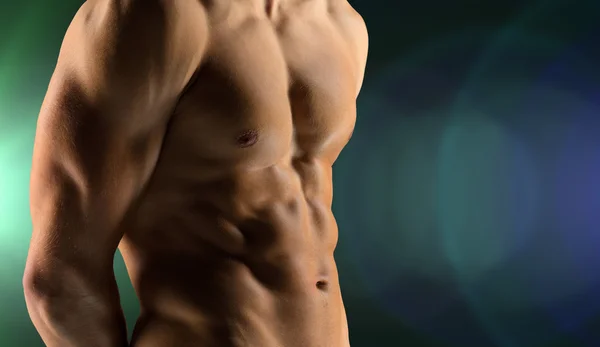 Close up of male bodybuilder bare torso — Stock Photo, Image