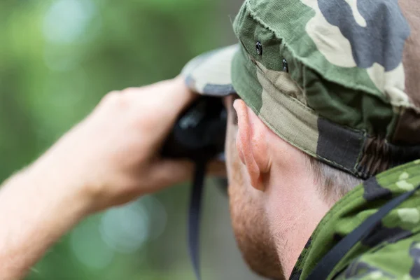 Close up of soldier or hunter with binocular — Stock Photo, Image