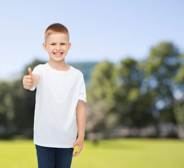 Smiling little boy in white blank t-shirt — Stock Photo, Image