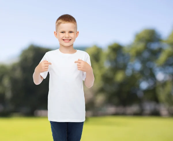 Smiling little boy in white blank t-shirt — Stock Photo, Image