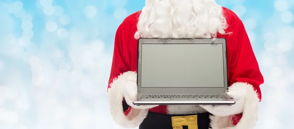 Close-up van de kerstman met laptop — Stockfoto