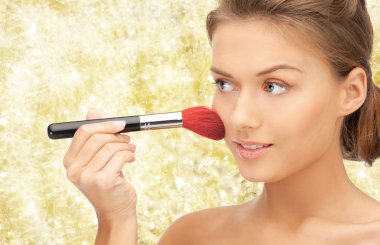 beautiful smiling woman with make up brush clipart