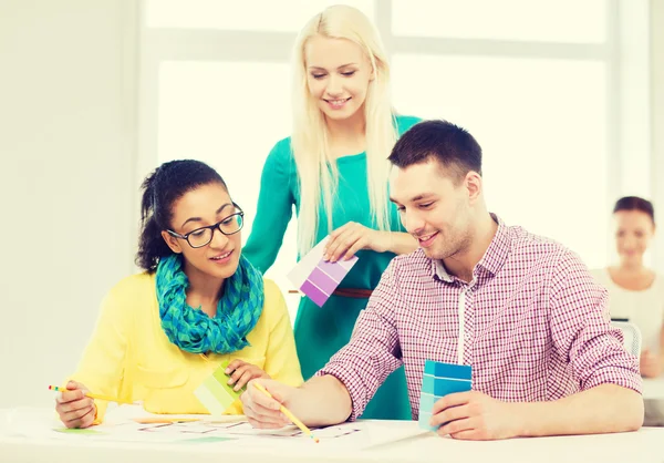 Smiling interior designers working in office — Stock Photo, Image