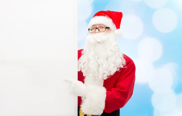 Mannen i kostym jultomten med billboard — Stockfoto