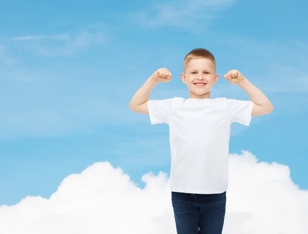 Smiling little boy in white blank t-shirt — Stock Photo, Image