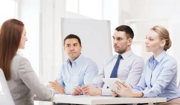 Business team interviewing applicant in office — Stock Photo, Image