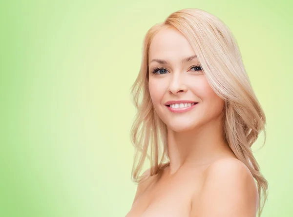 Beautiful young woman with bare shoulders — Stock Photo, Image