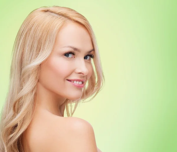 Beautiful young woman with bare shoulders — Stock Photo, Image