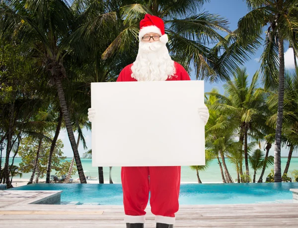 Muž v kostýmu santa Clause s billboard — Stock fotografie
