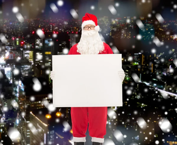 Uomo in costume di Babbo Natale con cartellone — Foto Stock