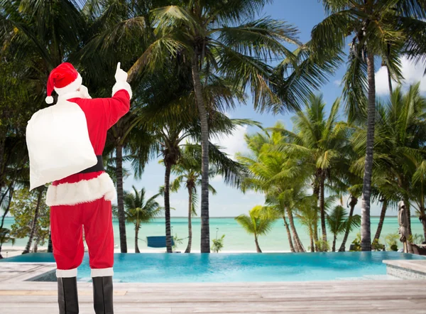 Man in costume of santa claus with bag — Stock Photo, Image