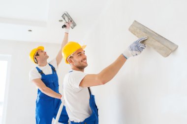 group of builders with tools indoors clipart