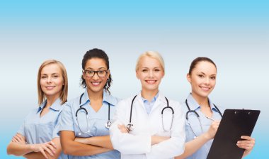 smiling female doctor and nurses with stethoscope clipart