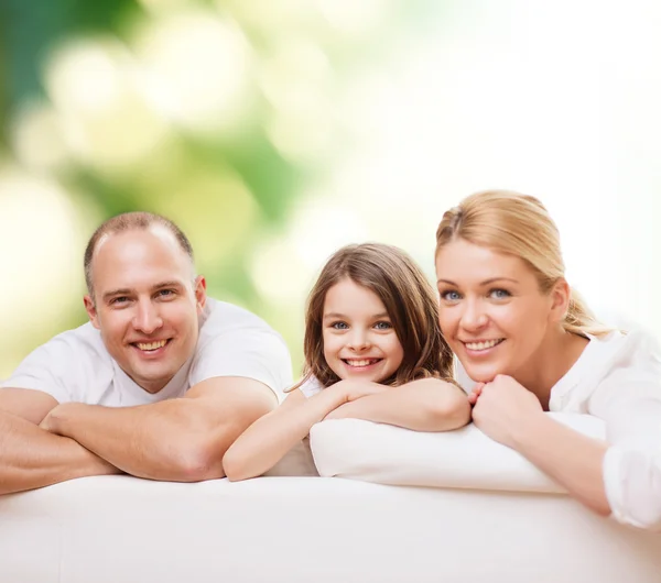 Família feliz em casa Fotos De Bancos De Imagens