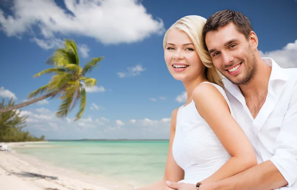 Couple having fun and hugging on beach Royalty Free Stock Images