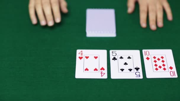 Holdem poker dealer with playing cards — Stock Video