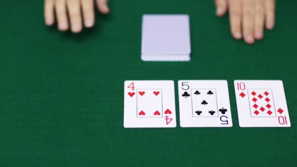 Holdem poker dealer with playing cards — Stock Video