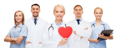 group of smiling doctors with red heart shape clipart