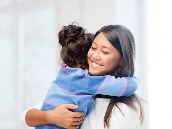 Hugging mother and daughter — Stock Photo, Image