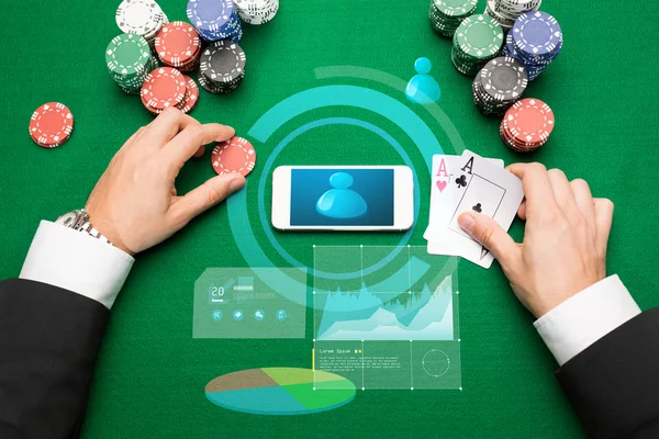 Casino player with cards, smartphone and chips — Stock Photo, Image