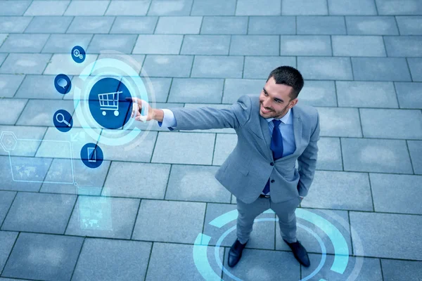 Young smiling businessman outdoors from top — Stock Photo, Image