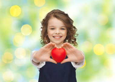smiling little girl with red heart clipart