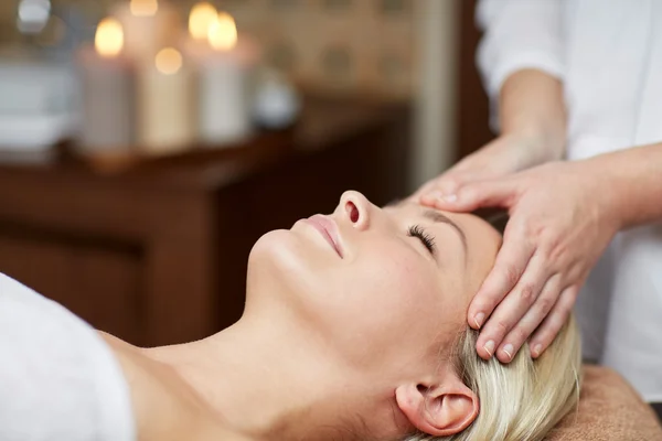 Close up of woman having face massage in spa — Stock Photo, Image