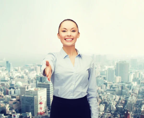 Femme d'affaires avec la main ouverte prête pour la poignée de main Photo De Stock