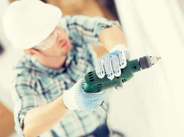 Man drilling the wall — Stock Photo, Image