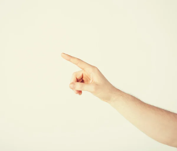 Man hand pointing at something — Stock Photo, Image