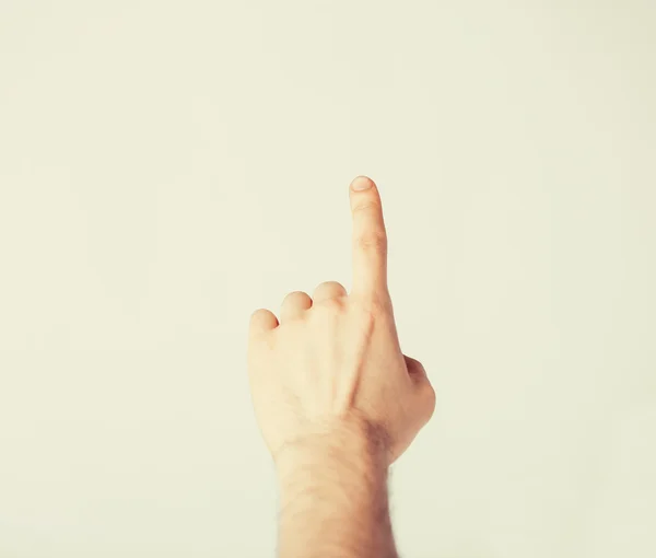 Man hand pointing at something — Stock Photo, Image