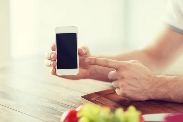 Close up of male hands holding smartphone — Stock Photo, Image