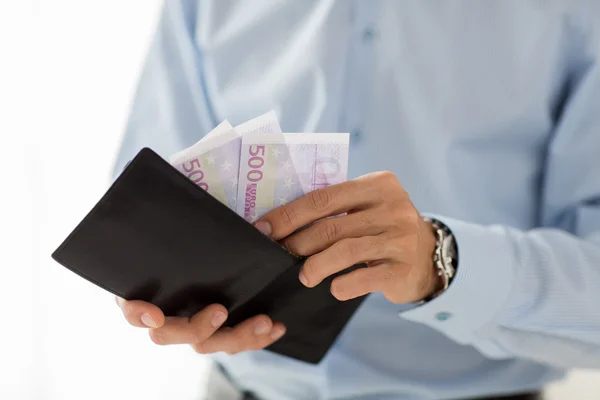 Close up of businessman hands holding money — Stock Photo, Image