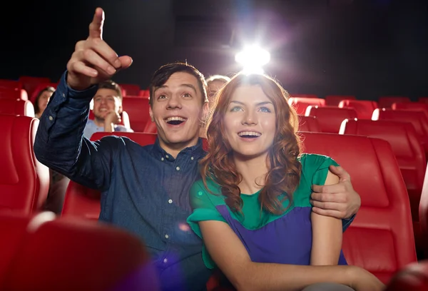 Happy friends watching movie in theater — Stock Photo, Image